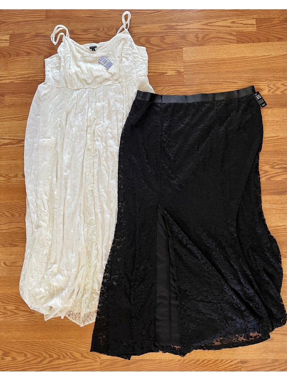 Torrid white lace maxi dress and black lace maxi skirt. Size 4. NWT.